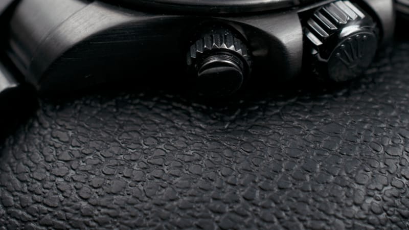 Black Rolex Cosmograph Daytona.