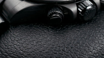 Black Rolex Cosmograph Daytona.